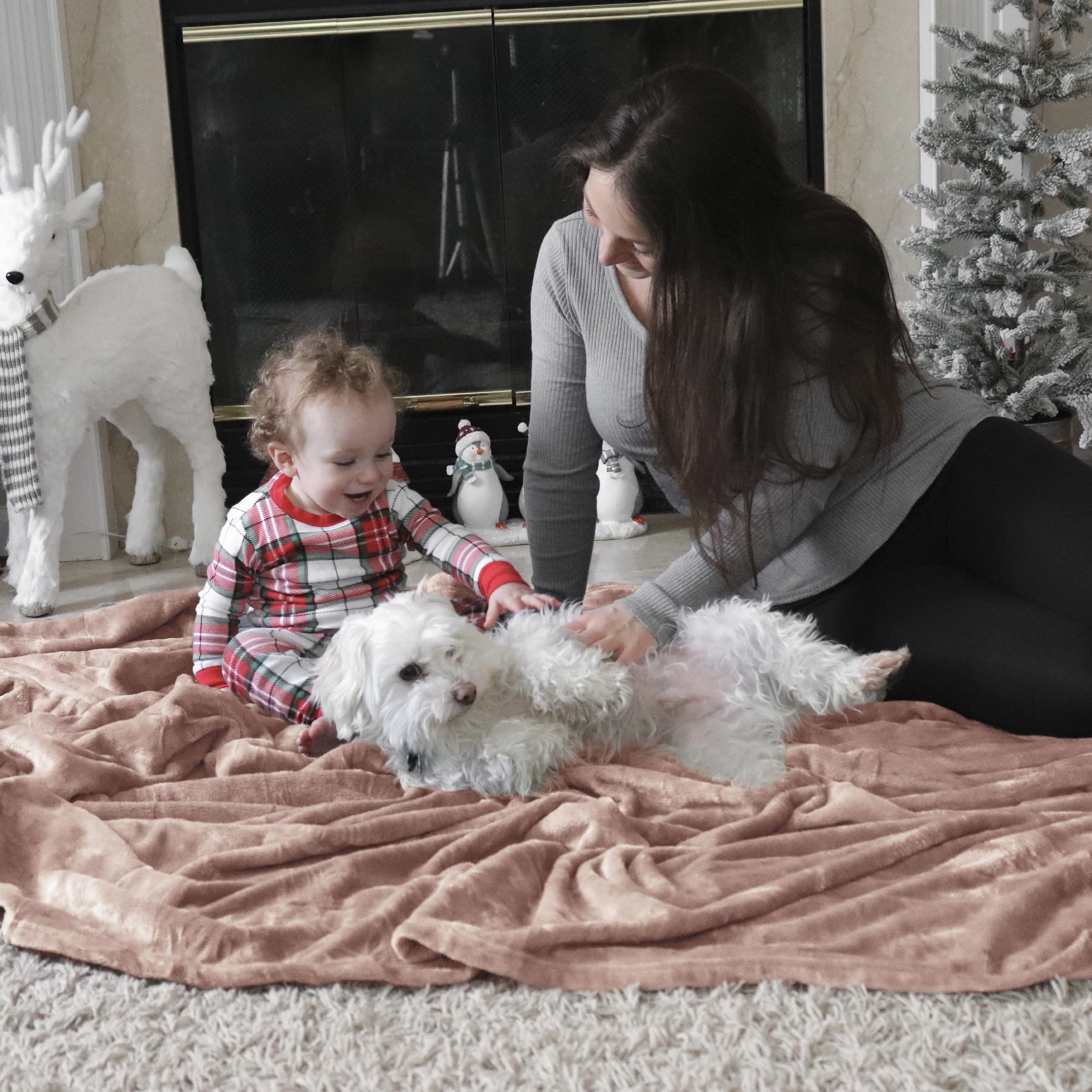 Bedsure blanket with a pet resting on it emphasizing easy-care comfort