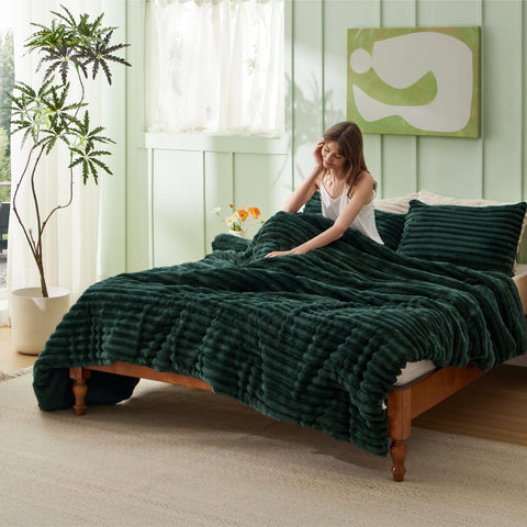 Bedsure folded comforter stack showing plush loft and easy storage benefit