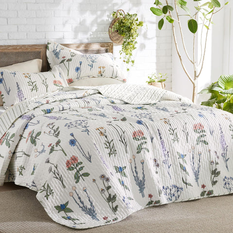 Bedsure quilt front view showing white floral print and calming style