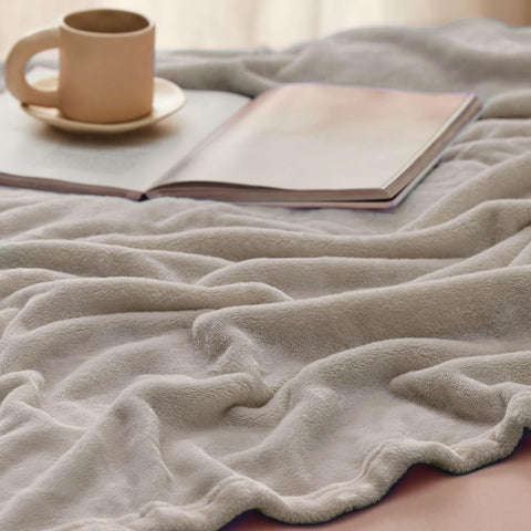 Bedsure folded blanket in basket styling for tidy storage and easy access