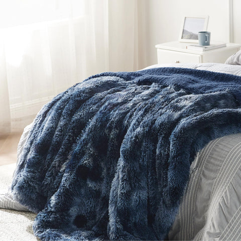 Bedsure blanket neatly folded in basket showing compact storage and tidy look