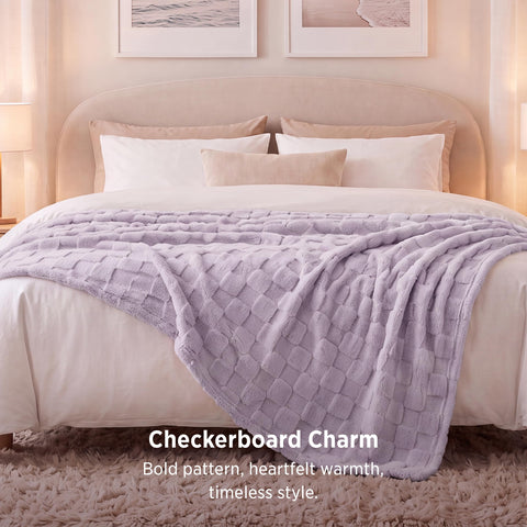 Bedsure folded on a queen bed showing full 90x90 size and cozy coverage for couples