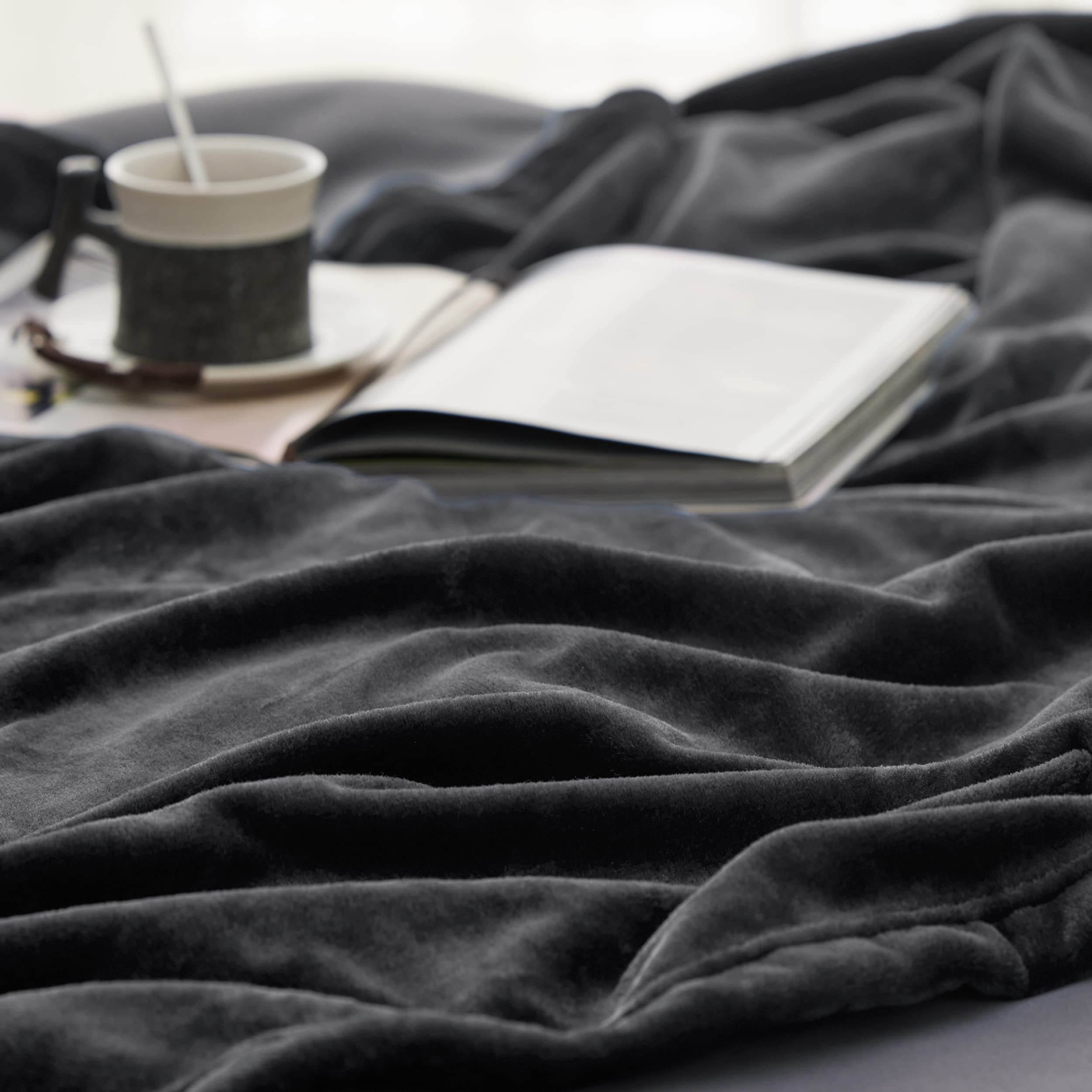 Bedsure folded storage compact showing portability and tidy storage