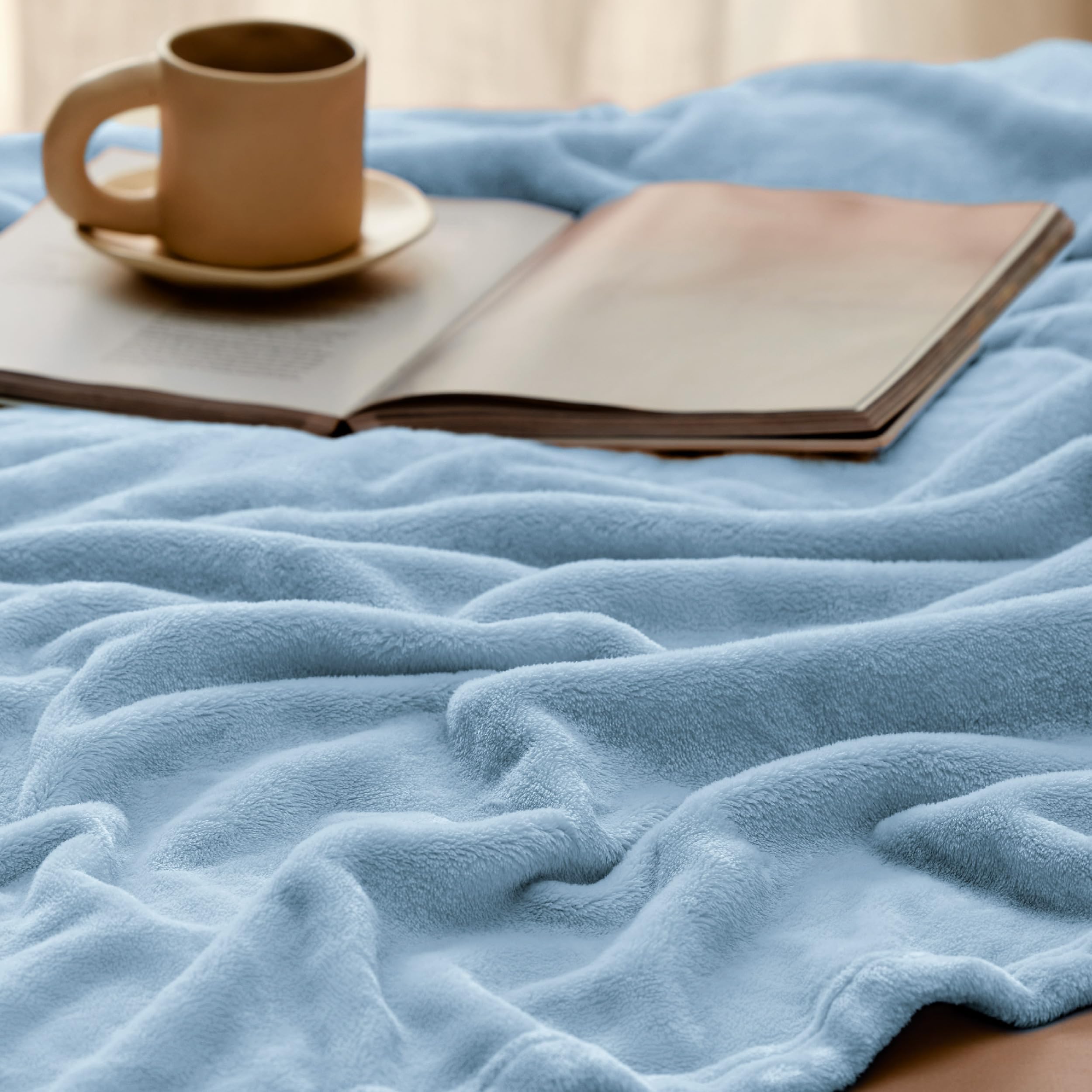 Bedsure GentleSoft draped on couch showing versatile home decor benefit