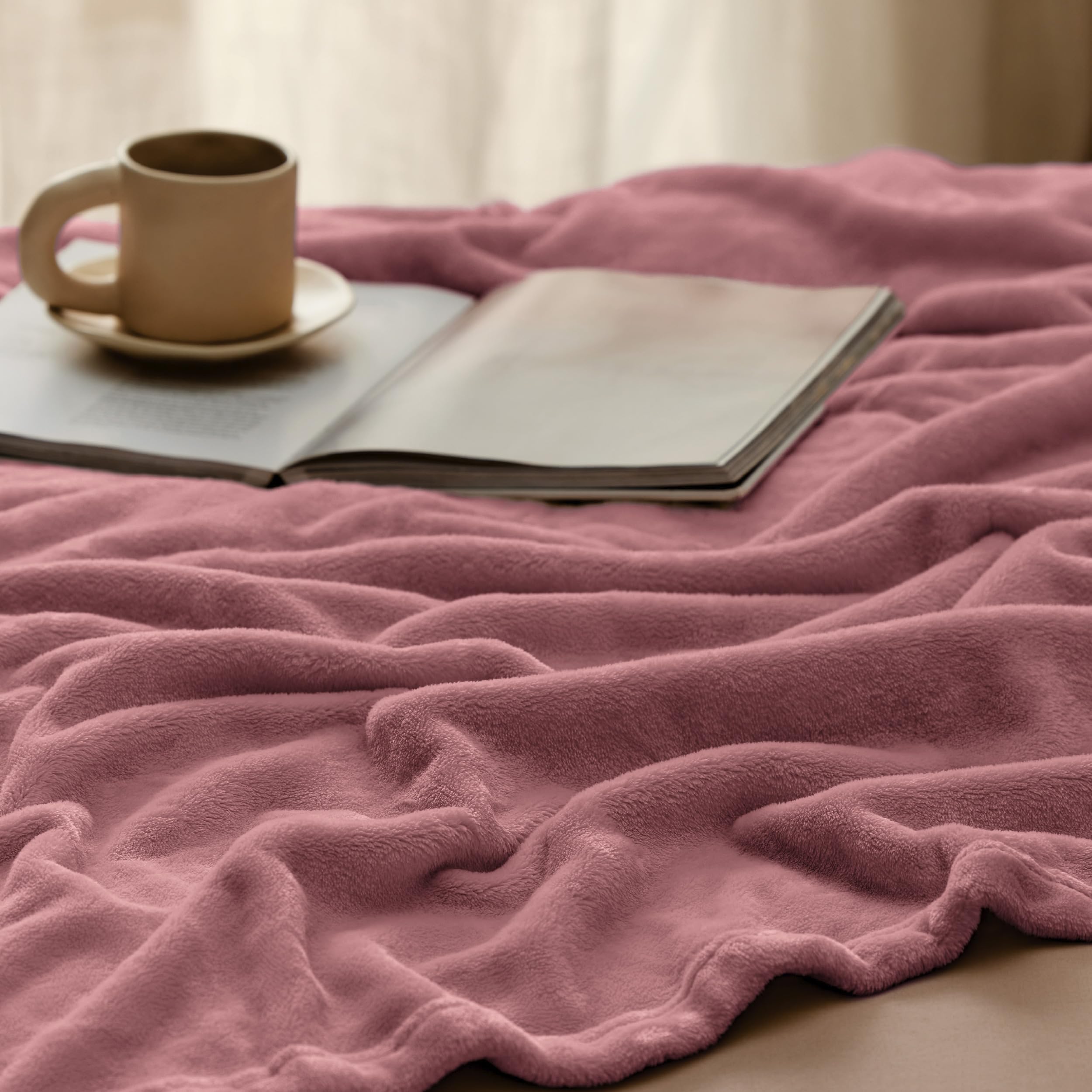 Bedsure GentleSoft draped over sofa highlighting stylish living room warmth