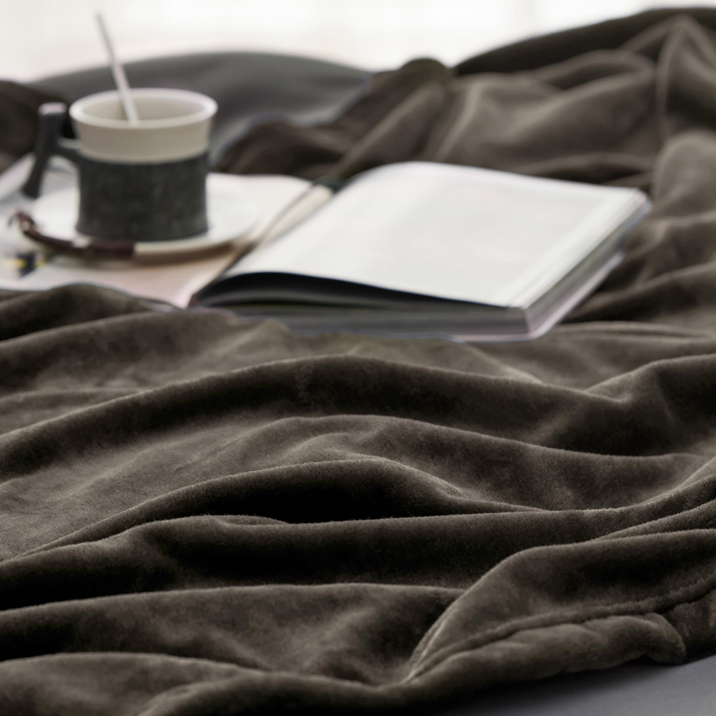 Bedsure folded blanket next to ruler showing twin 60x80 size for scale