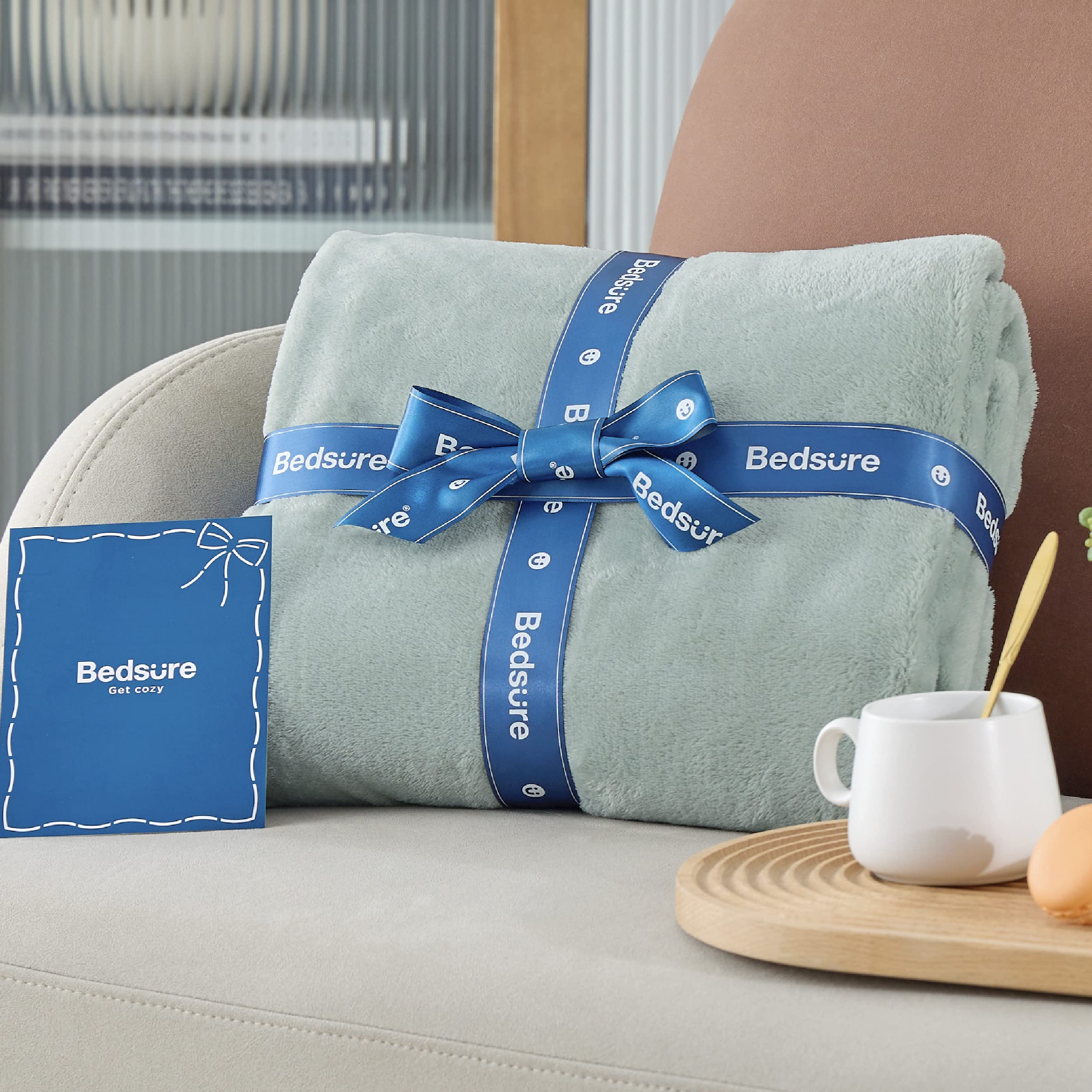 Bedsure GentleSoft rolled for travel illustrating lightweight packable convenience