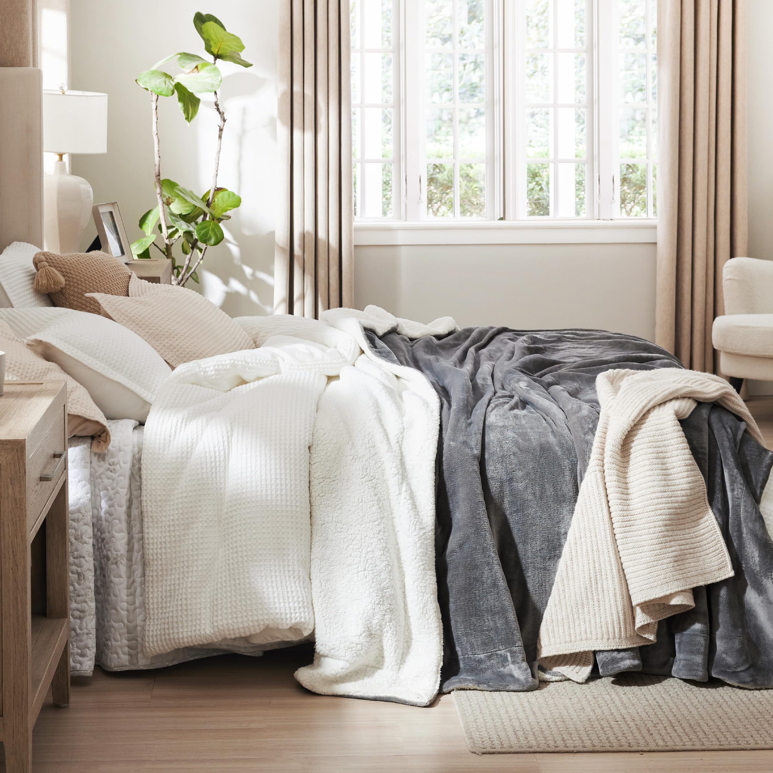 Bedsure blanket with pet and family showing multi-use coziness and pet-friendly fabric