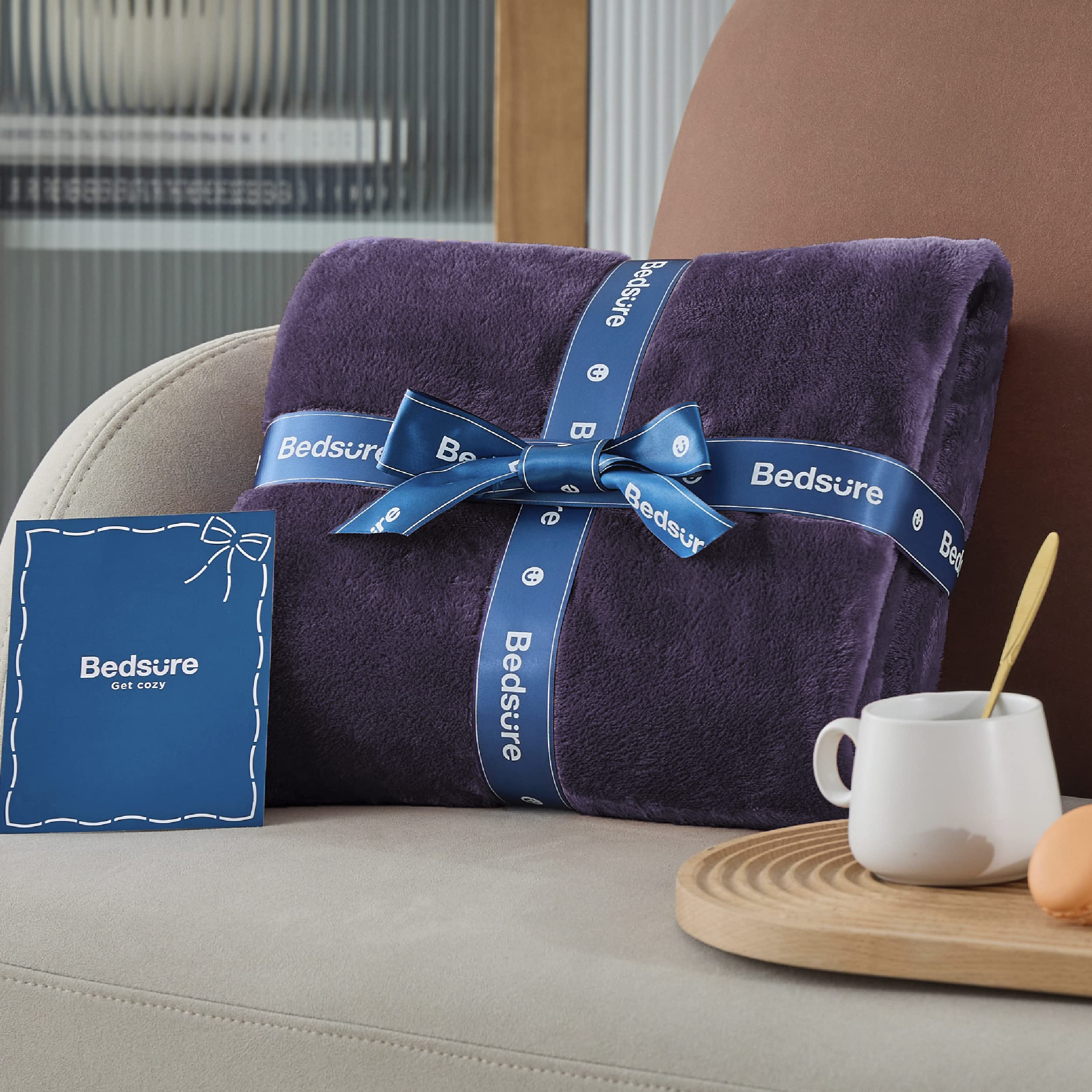 Bedsure GentleSoft rolled for travel showing compact size and portability