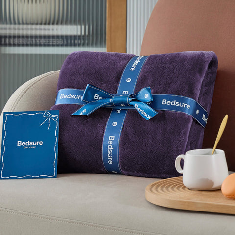 Bedsure GentleSoft rolled for travel showing compact size and portability