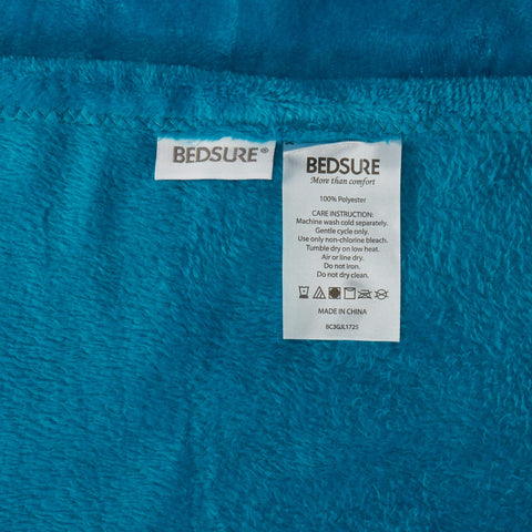 Bedsure GentleSoft spread on sofa illustrating living room comfort