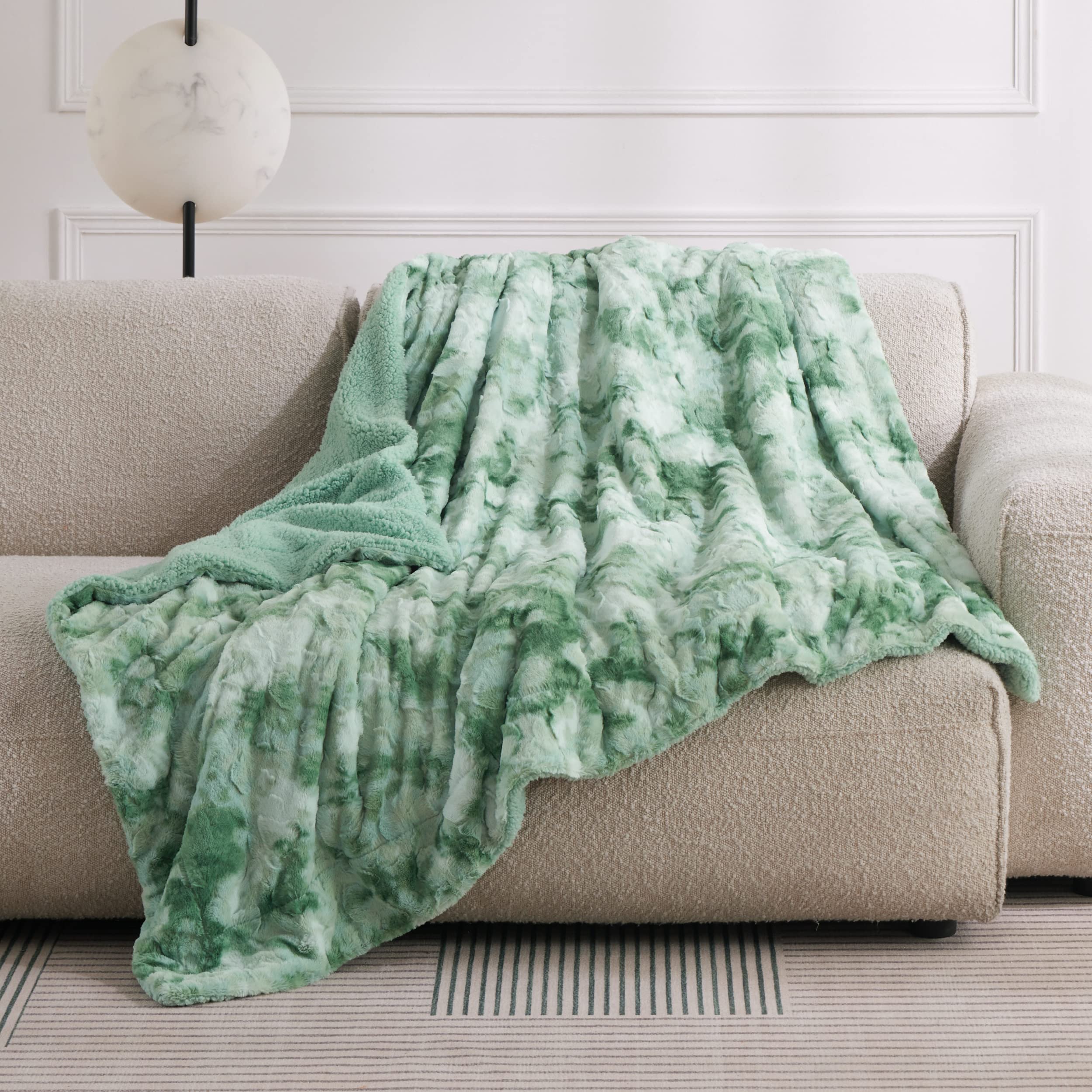 Bedsure throw on couch with person relaxing providing cozy styling