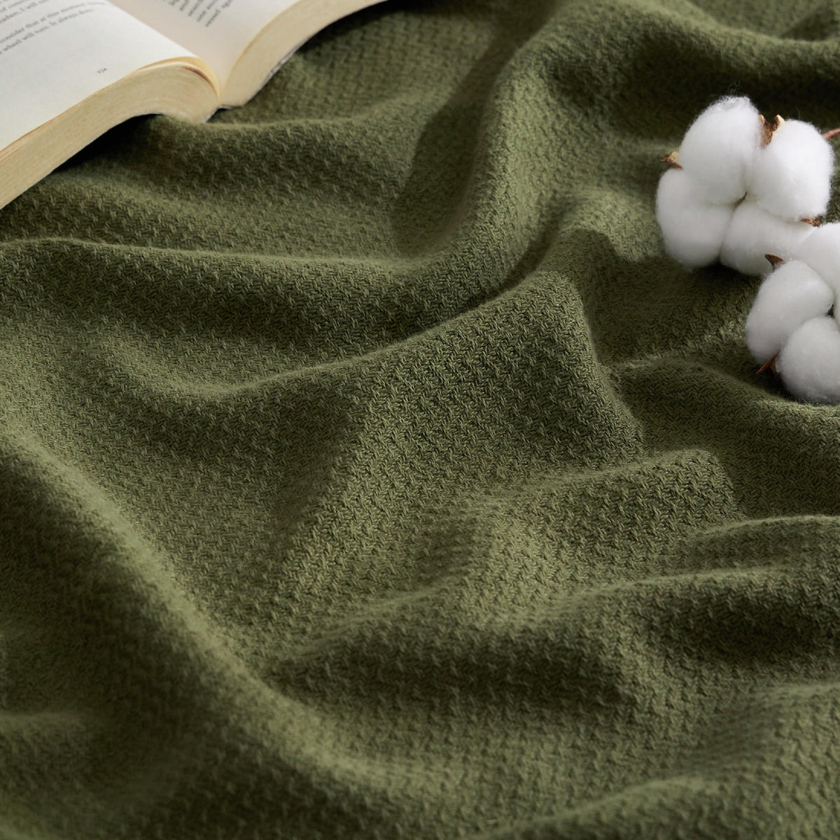 Bedsure green herringbone blanket front folded showing neat drape and cozy look