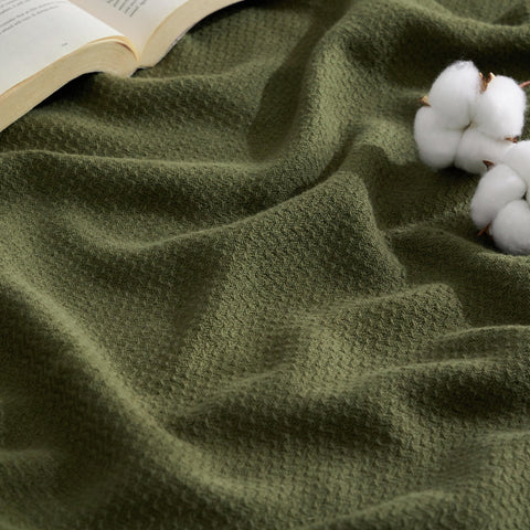 Bedsure green herringbone blanket front folded showing neat drape and cozy look