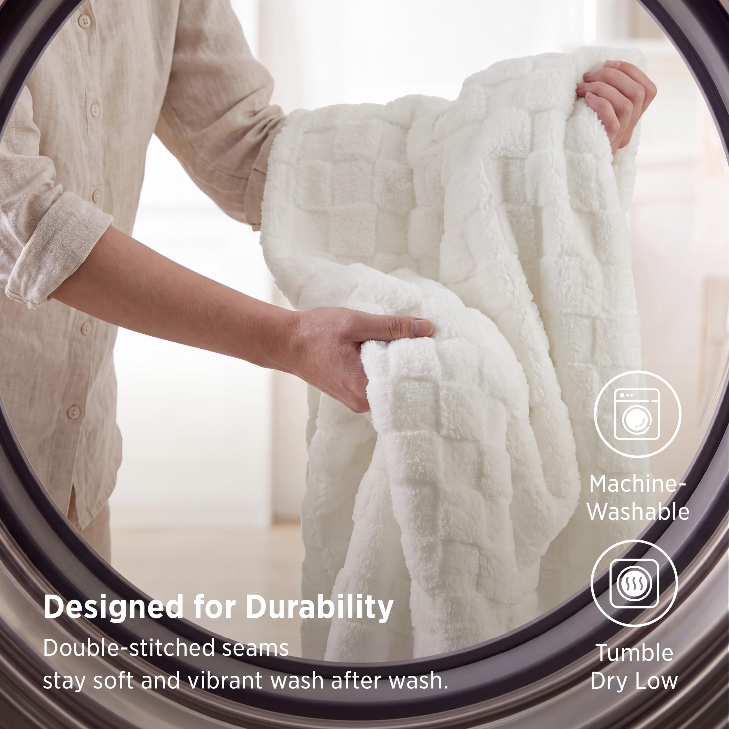 Bedsure hand pressing plush fabric to show soft microfiber feel and immediate coziness