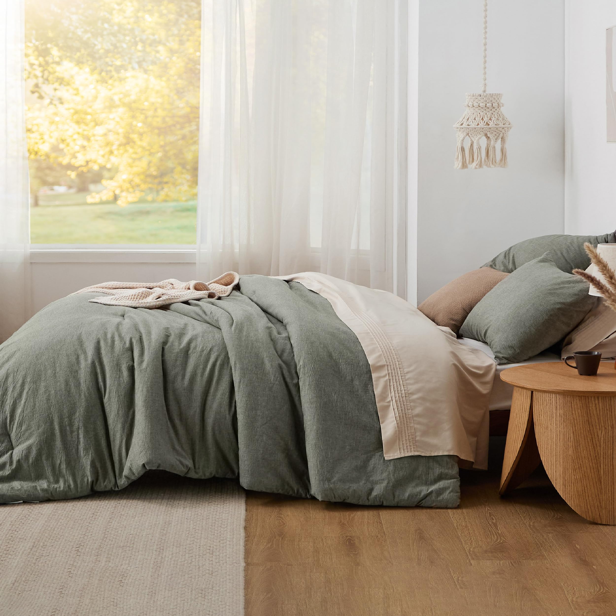 Bedsure hand touching fabric to show soft prewashed texture