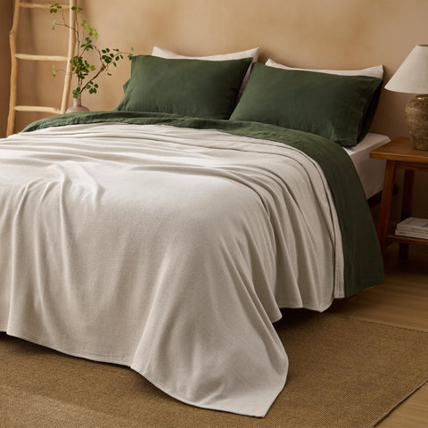 Bedsure blanket beside ruler showing queen-size scale and generous coverage