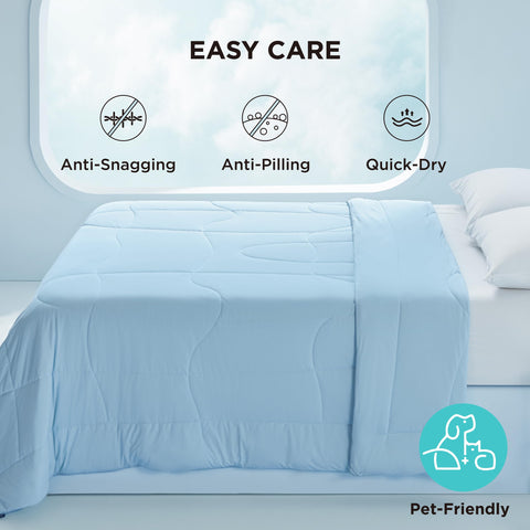 Bedsure comforter held in hand showing soft drape for instant cool-to-touch comfort