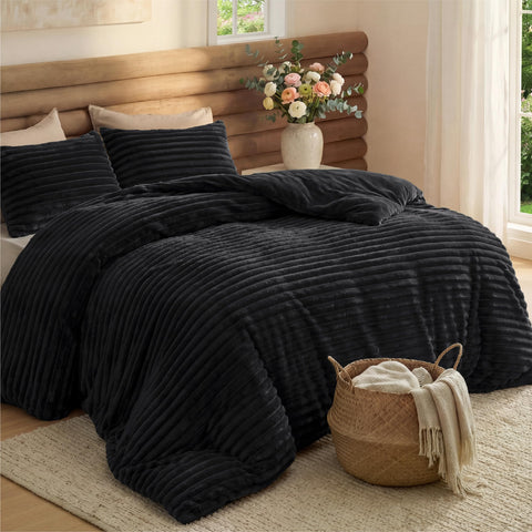 Bedsure comforter front view on king bed showing plush black fleece and cozy appeal