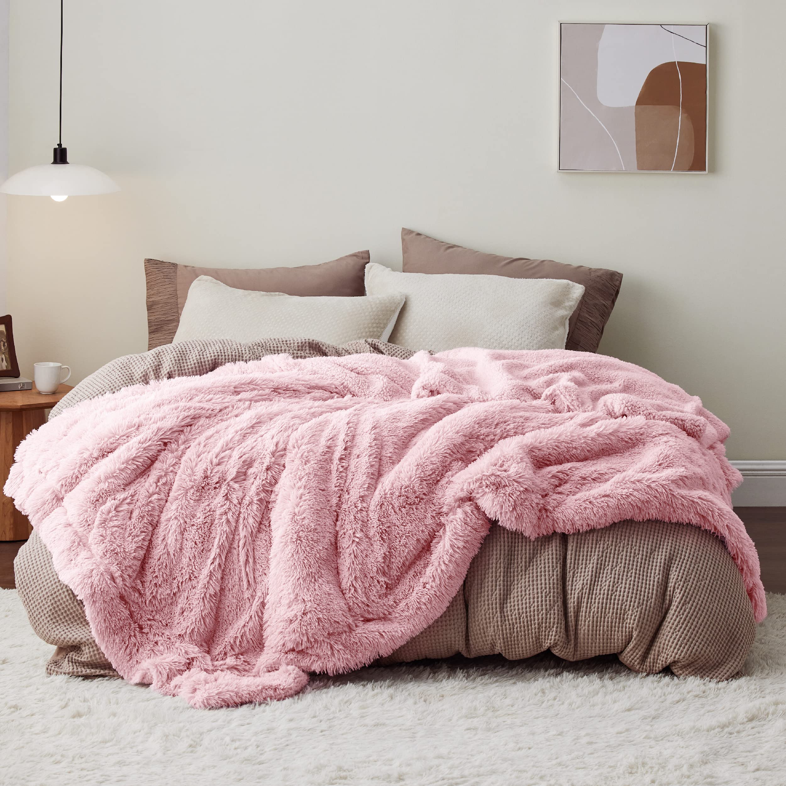 Bedsure pink blanket front view showing plush faux fur and decor appeal