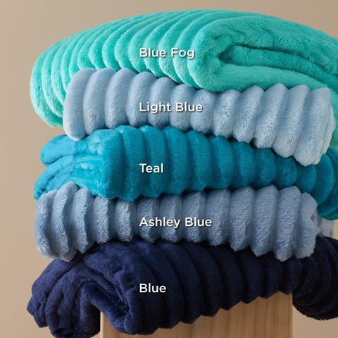 Bedsure throw styled on bedroom bench adding layered decor and comfort