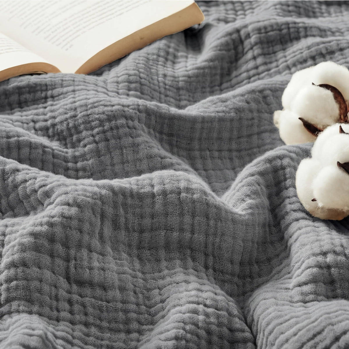 Bedsure cotton muslin blanket front view shows soft grey throw and cozy benefit