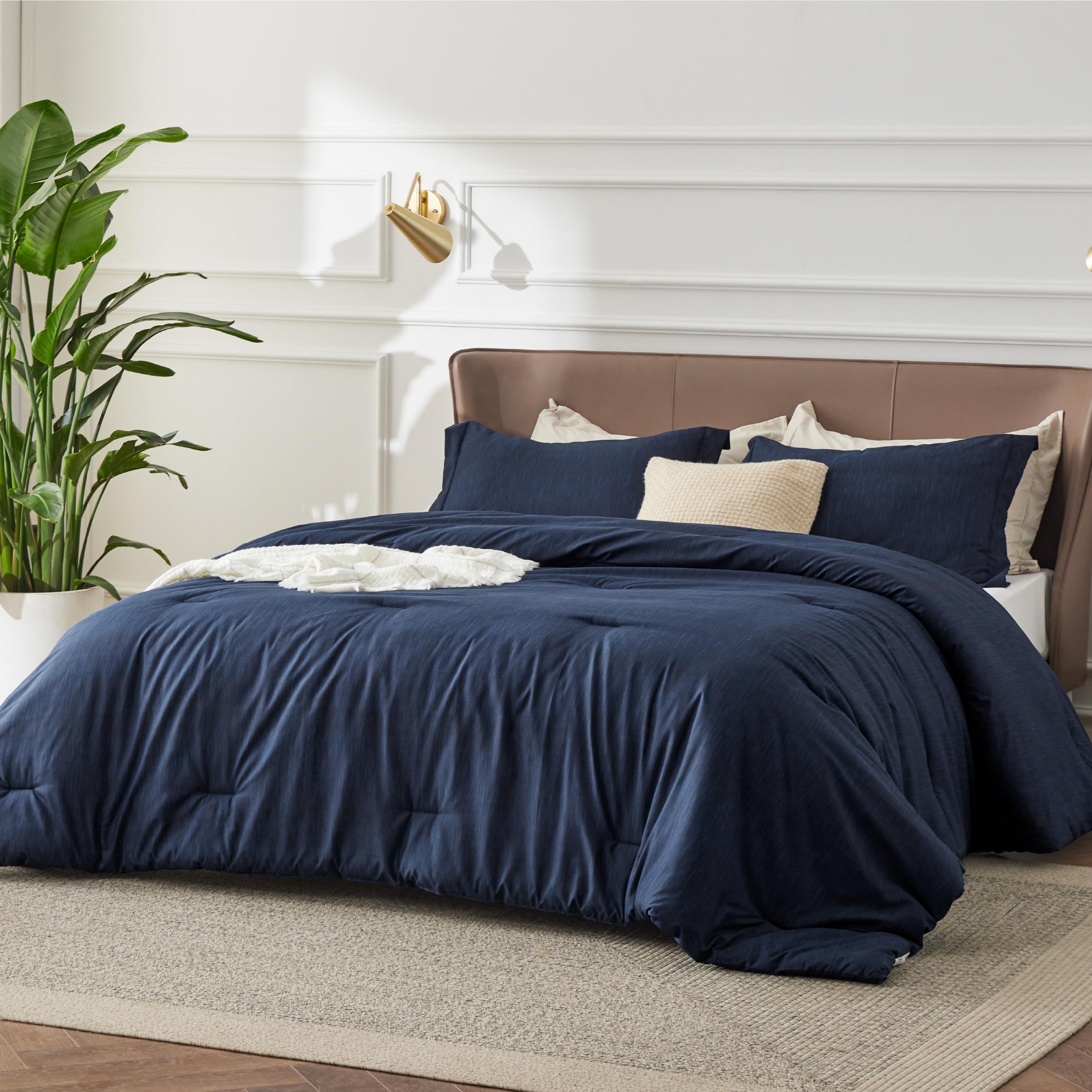 Bedsure navy comforter on styled bedroom showing versatile decor appeal