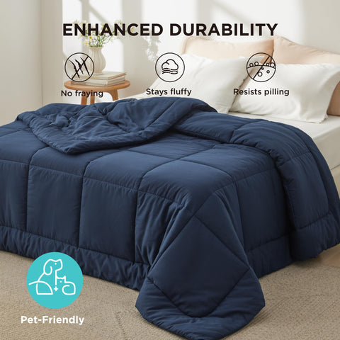Bedsure comforter styled in navy bedroom setting showing modern dorm or guest room