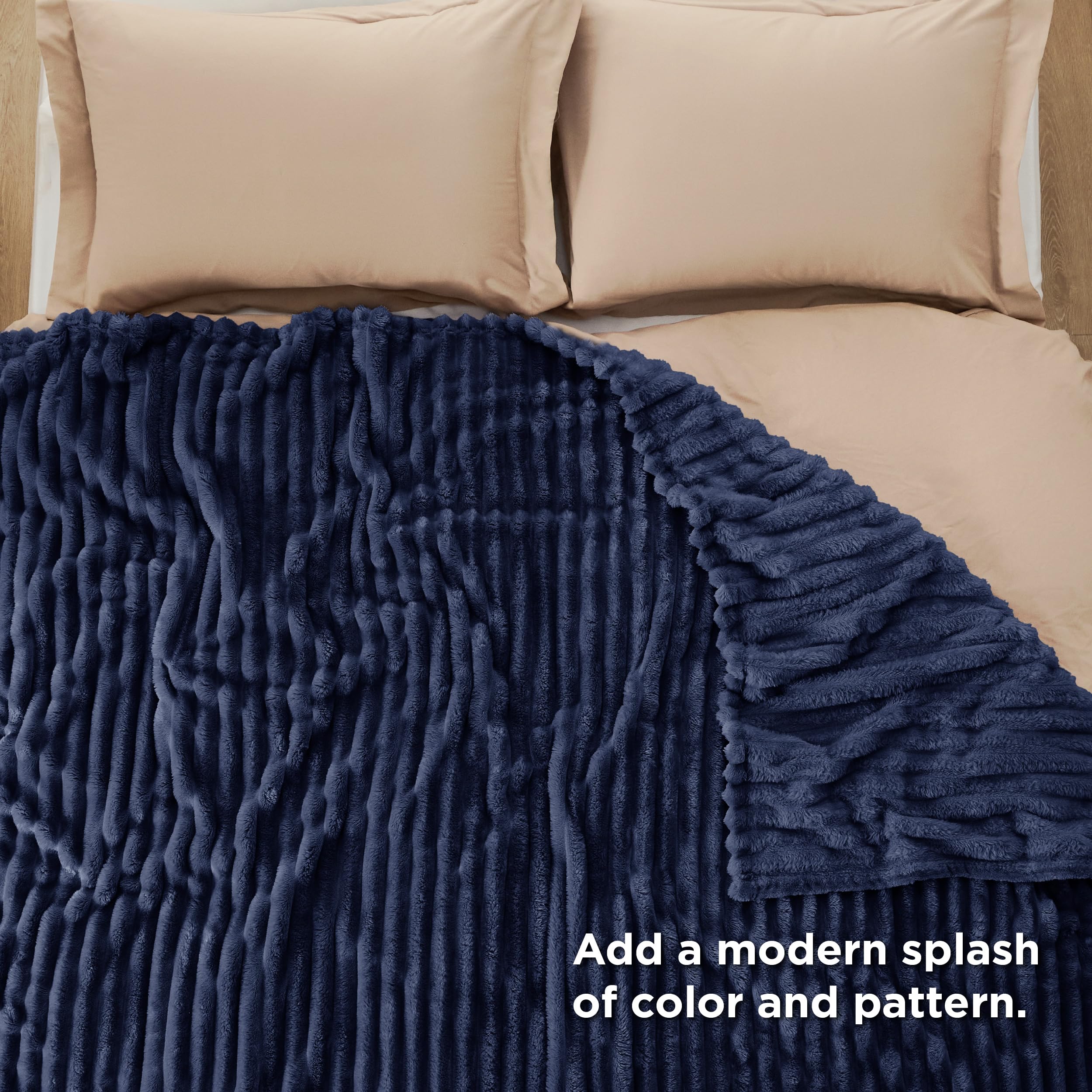 Bedsure navy blanket seam and edge stitching showing durable reinforced finish