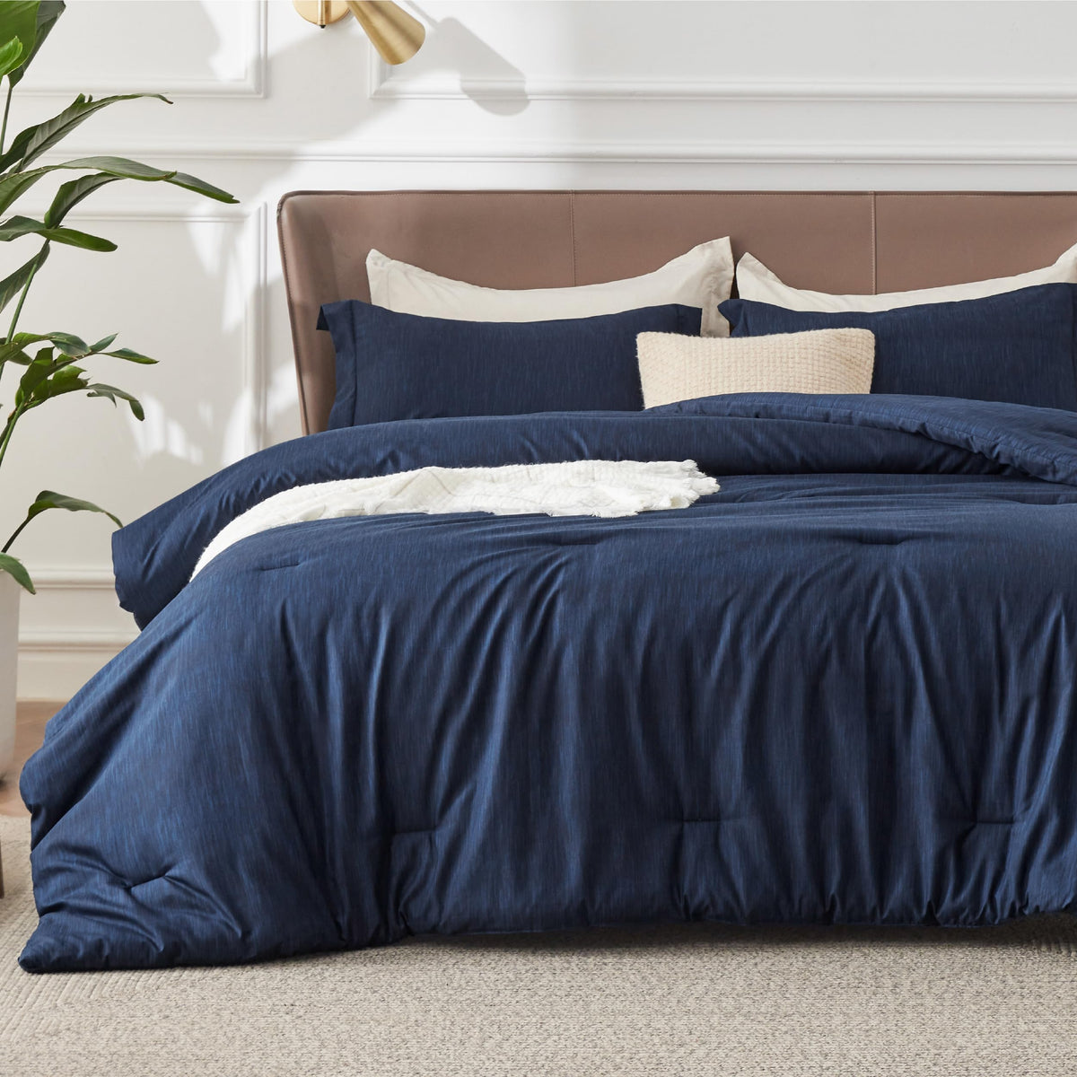 Bedsure navy comforter front view showing full bed coverage and cozy look