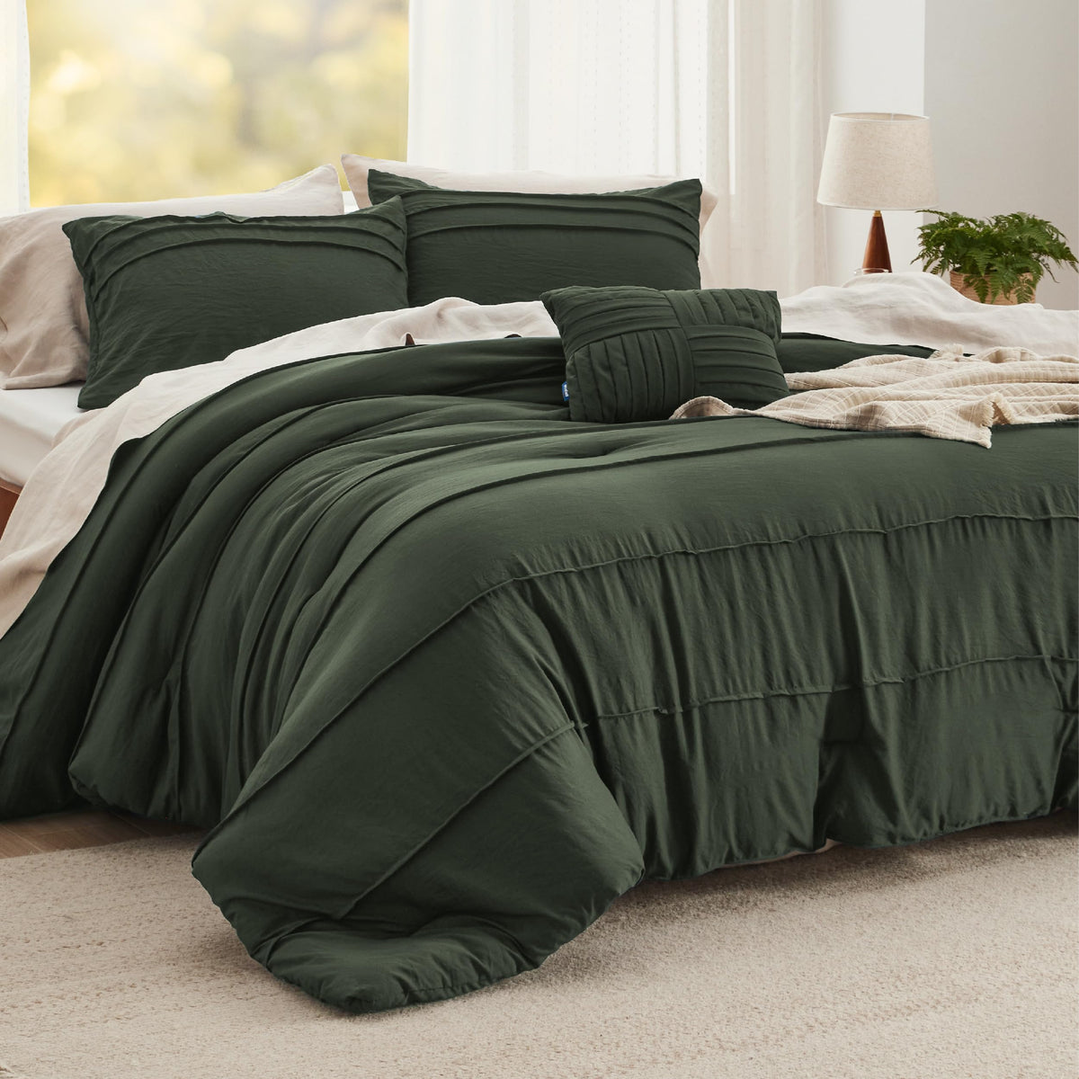 Bedsure front view of olive green comforter set showing elegant pinch pleat and cozy look