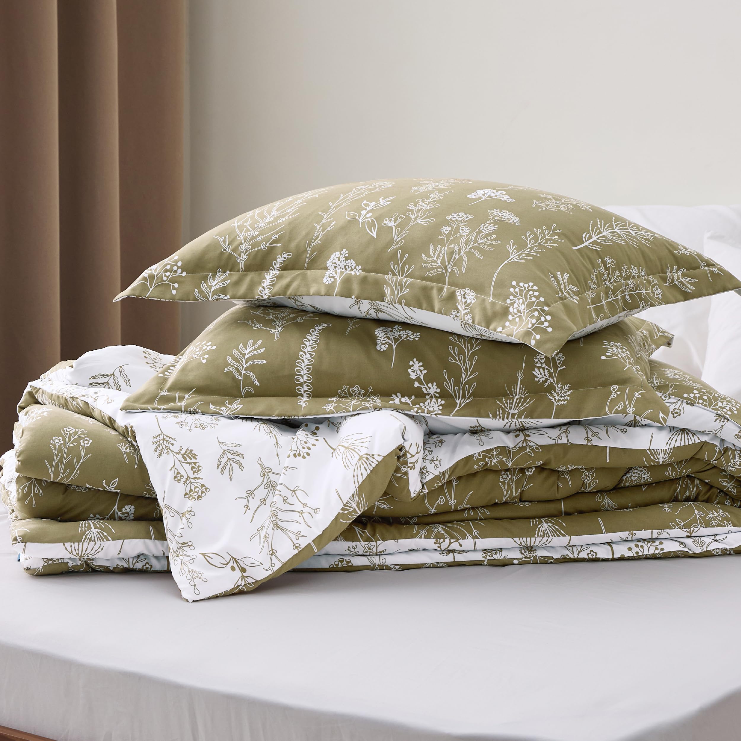 Bedsure comforter on queen bed for scale, demonstrates true size coverage
