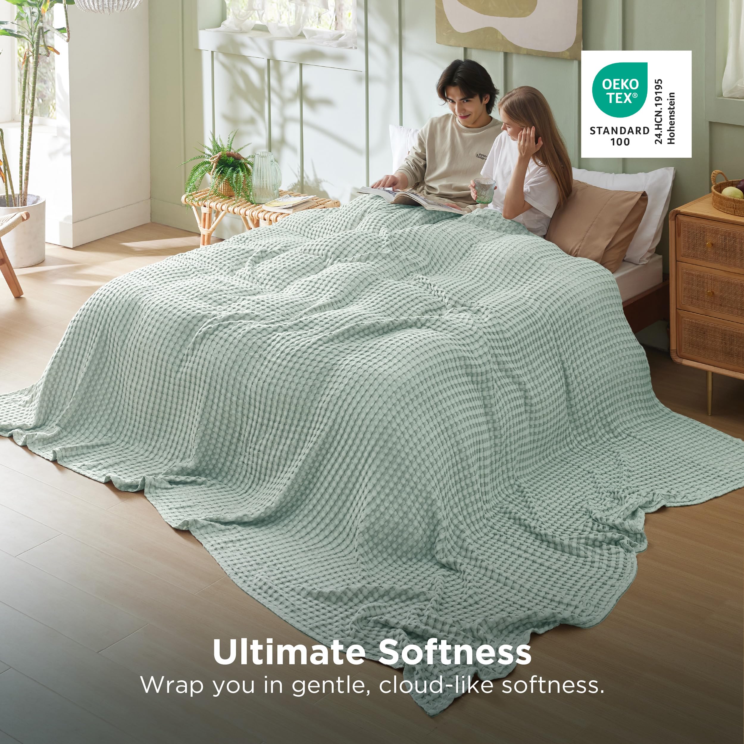 Bedsure blanket styled on bed with duvet showing layered cooling and decor benefit