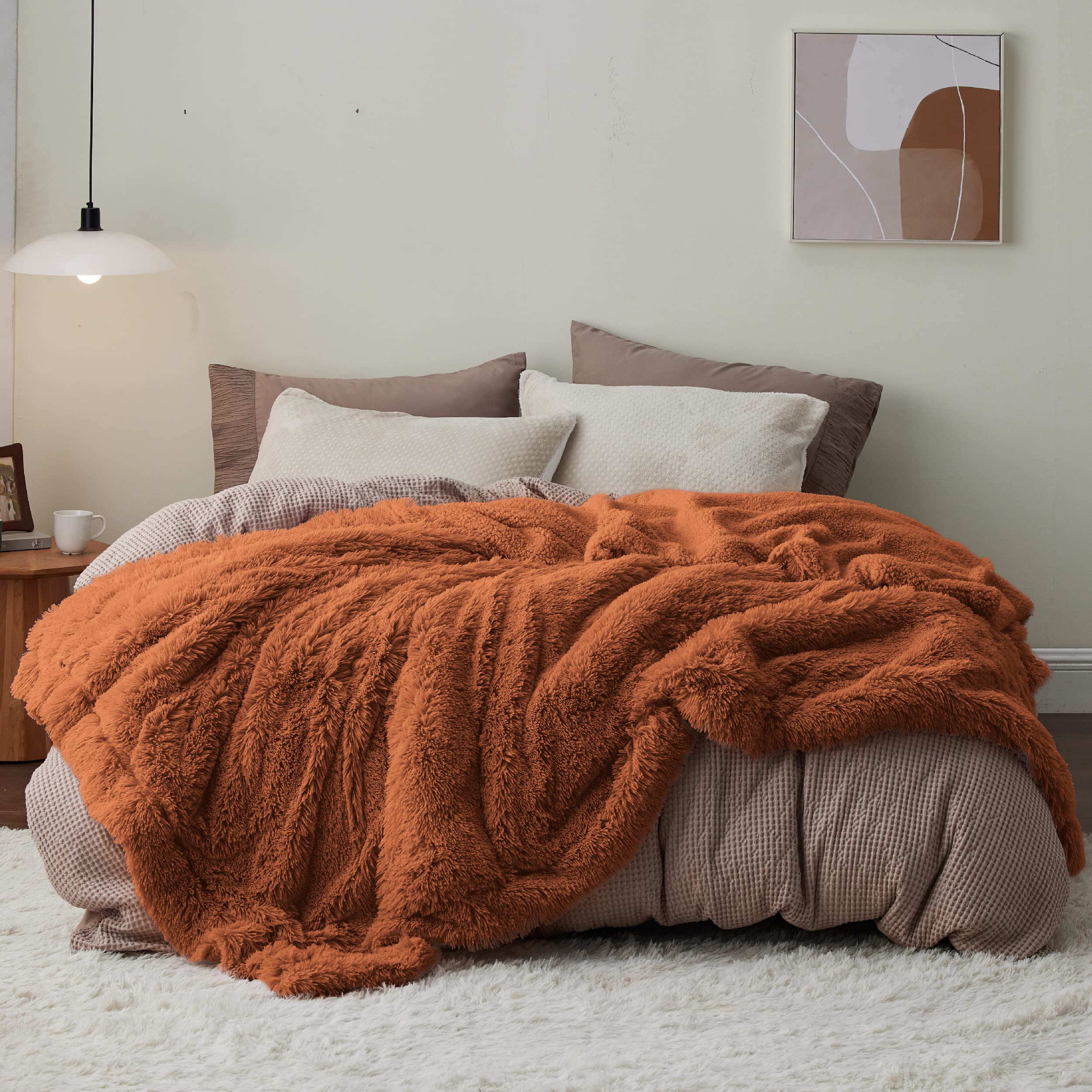 Bedsure blanket on queen bed styled with pillows for modern bedroom appeal