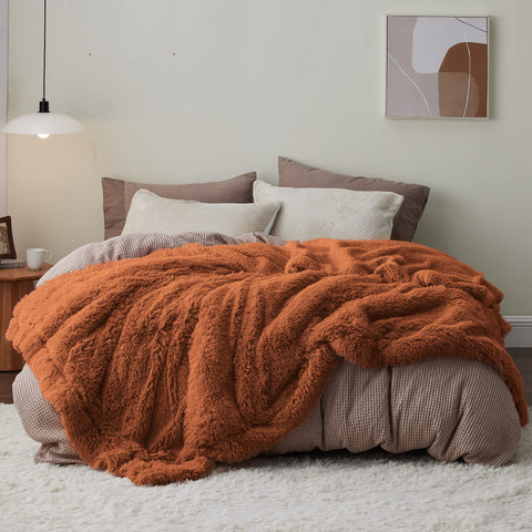 Bedsure blanket on queen bed styled with pillows for modern bedroom appeal
