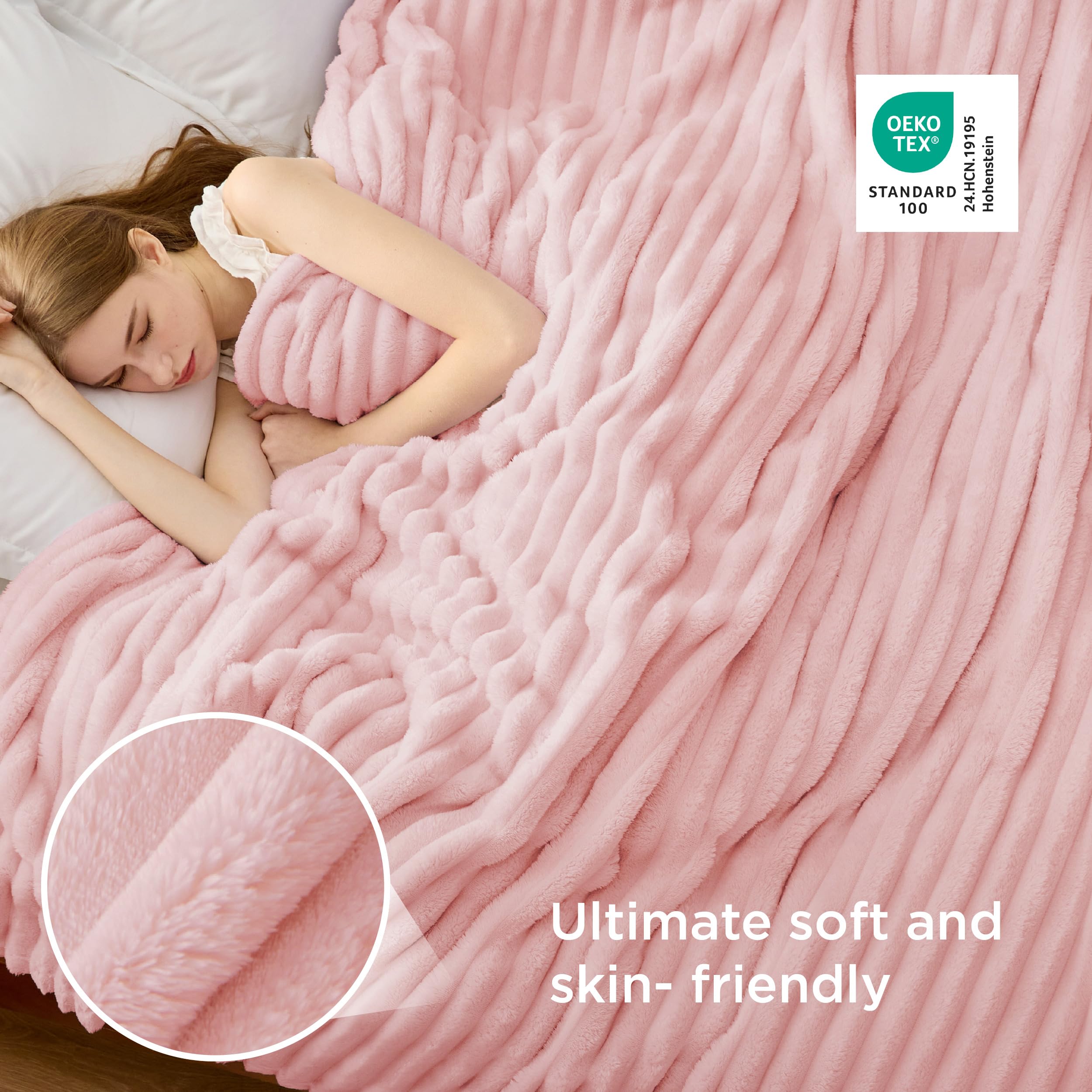 Bedsure coral pink blanket spread on queen bed showing drape and color harmony
