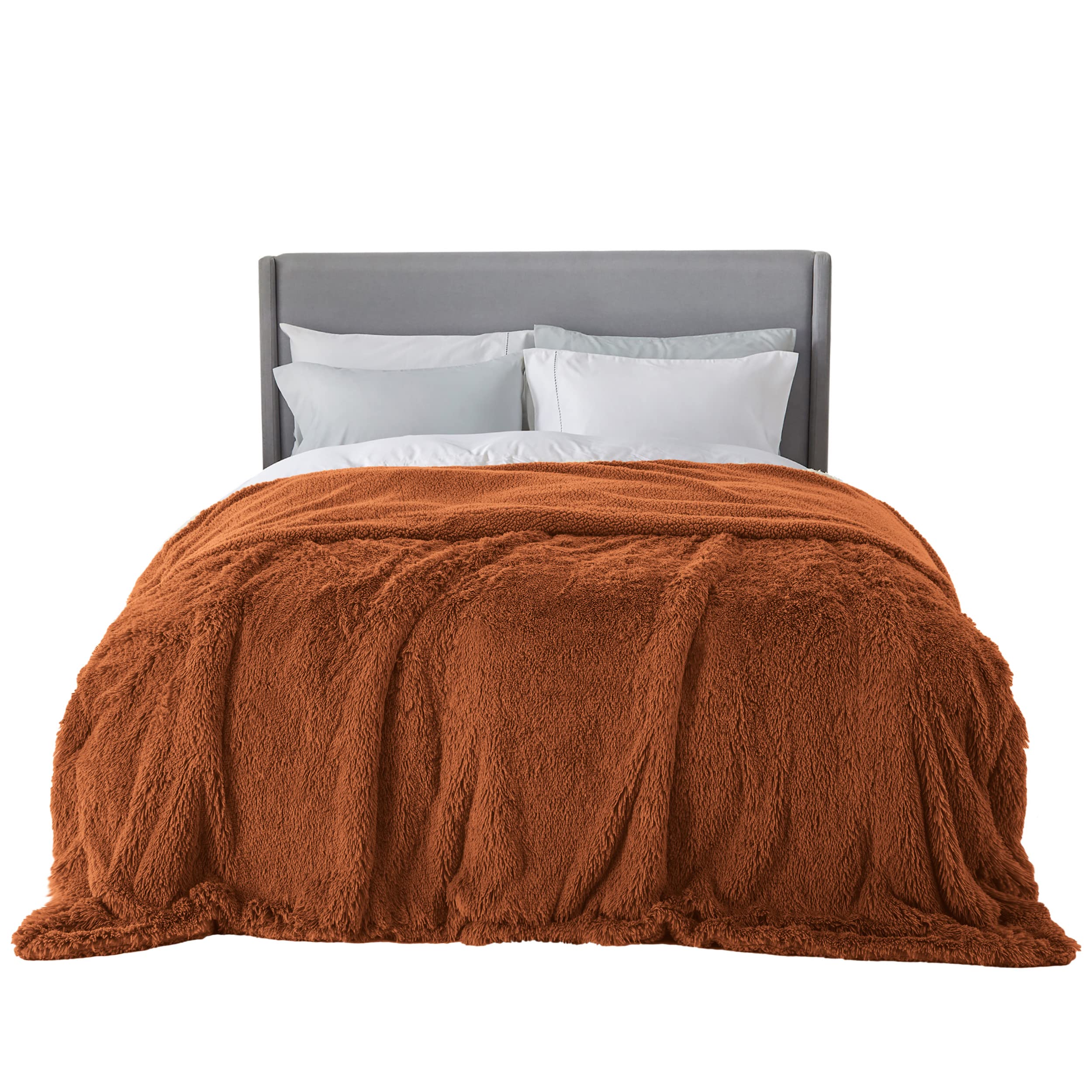 Bedsure orange faux fur blanket front view shows plush look and decorative appeal