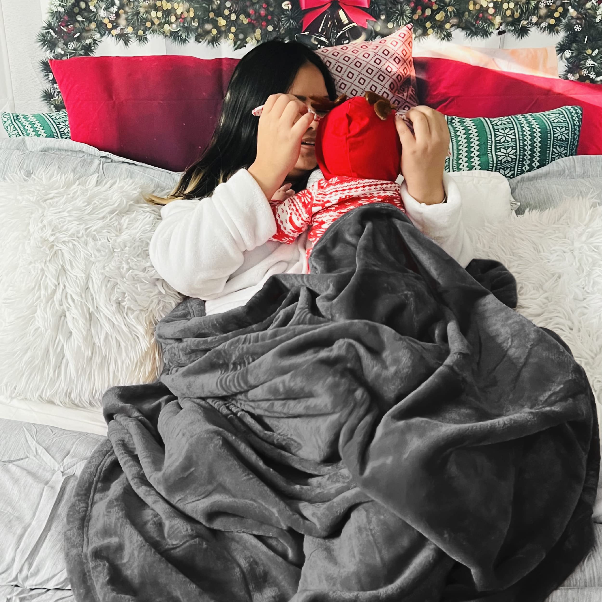 Bedsure person lounging on sofa using blanket for comfortable relaxation