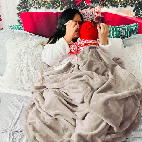 Bedsure blanket with pet curled on it showing durable, pet-friendly coziness