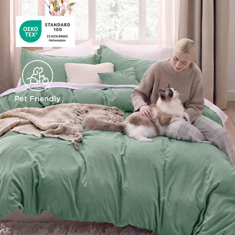 Bedsure pillow shams laid flat showing matching sage green and easy-care benefit