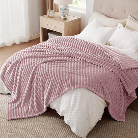 Bedsure blanket next to ruler for size comparison illustrating oversized dimensions