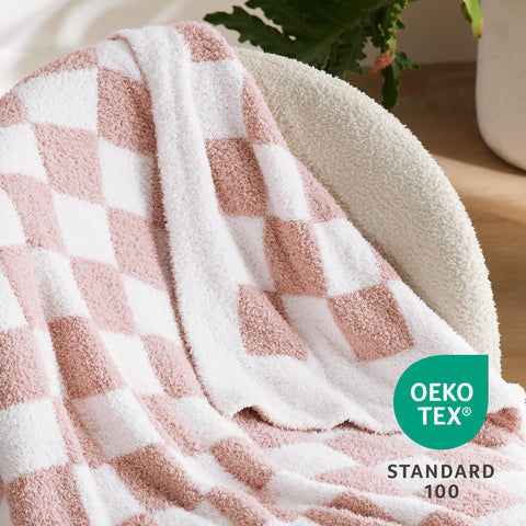 Bedsure blanket held in hands showing lightweight feel and portability benefit