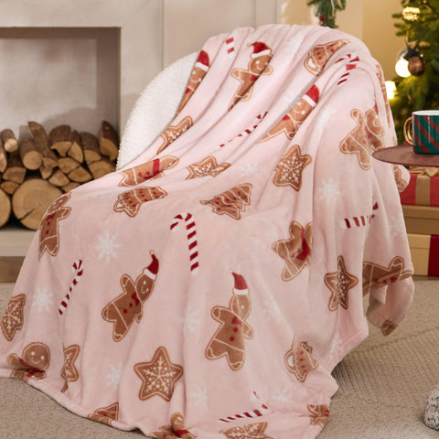 Bedsure pink throw front folded showing festive gingerbread design and cozy appeal