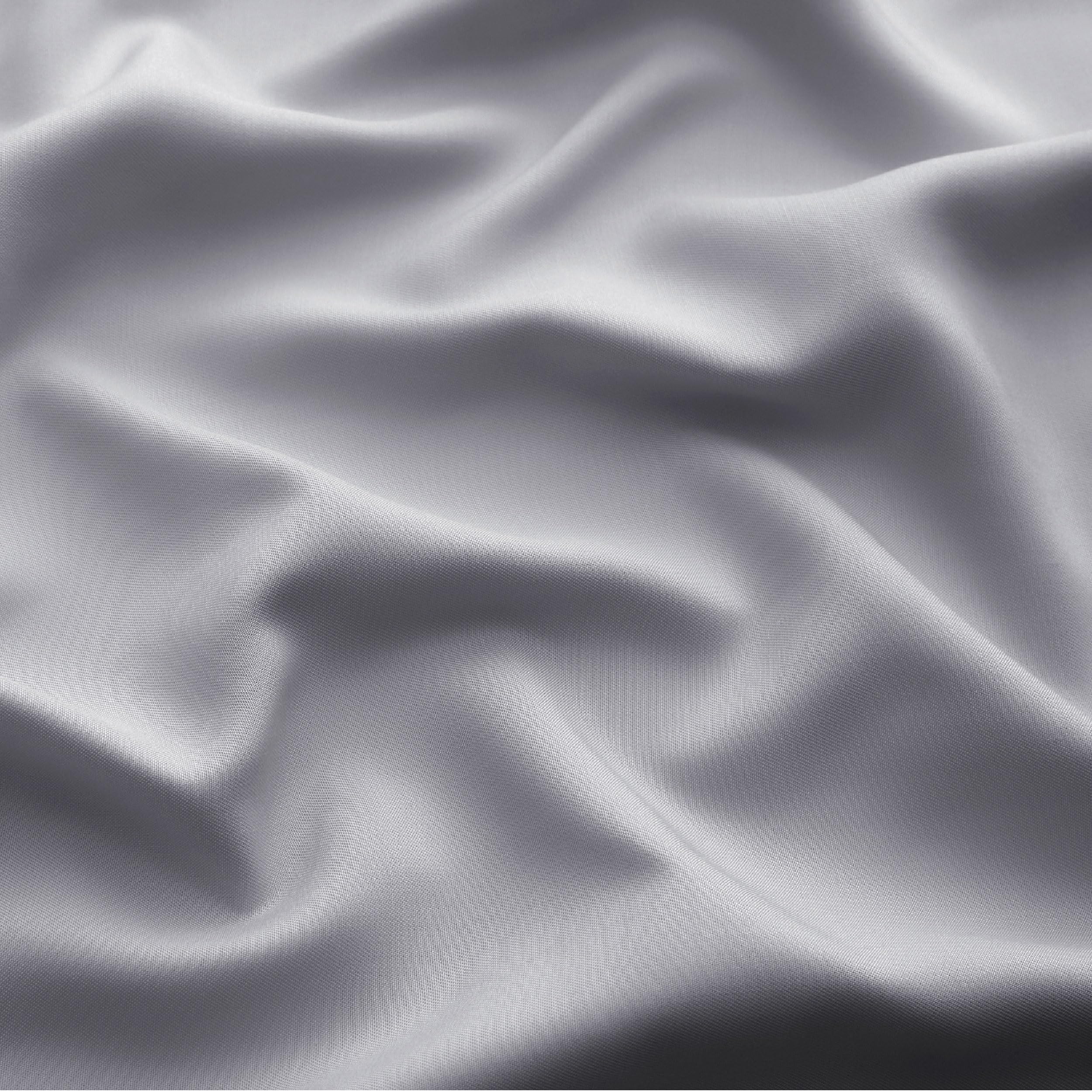 Bedsure PureWoven texture under hand showing soft, cool-to-touch fabric