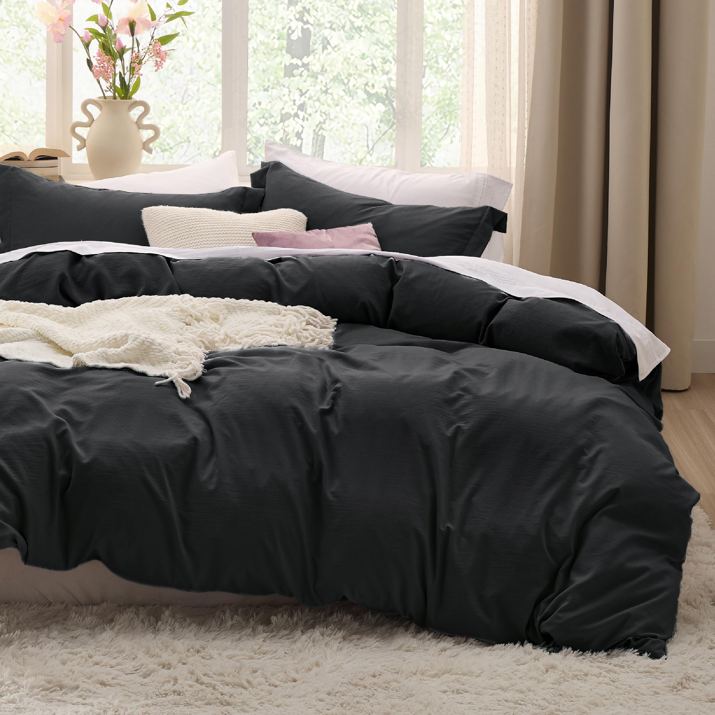 Bedsure black queen duvet cover front view showing smooth cotton-like softness
