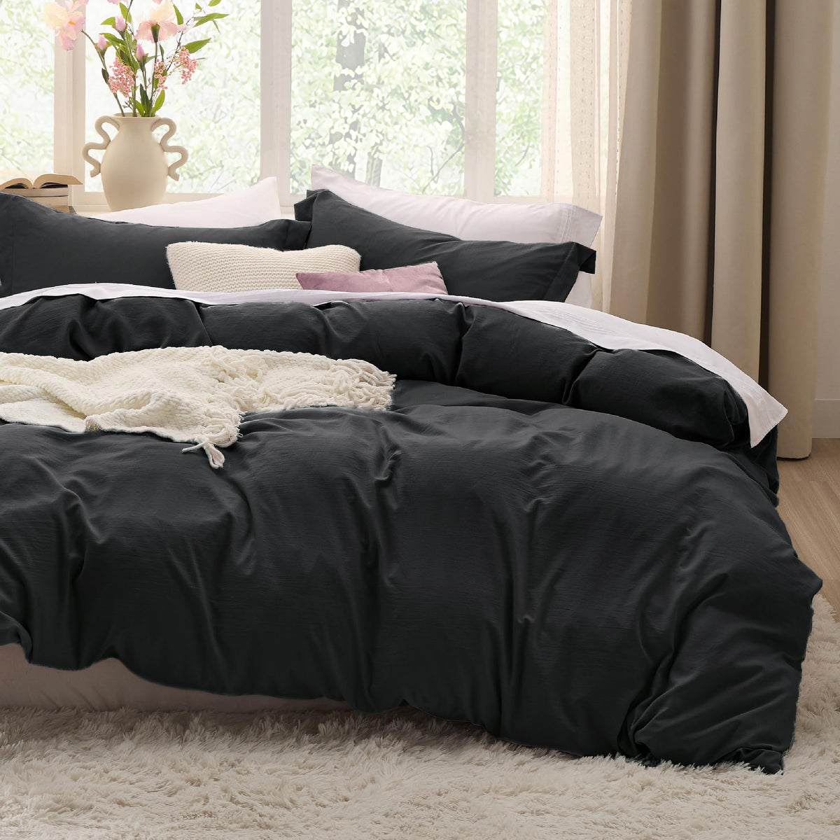 Bedsure black queen duvet cover front view showing smooth cotton-like softness