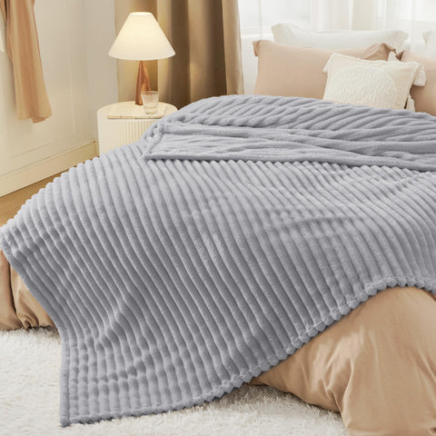 Bedsure blanket beside ruler showing 108x90 dimensions for accurate sizing benefit