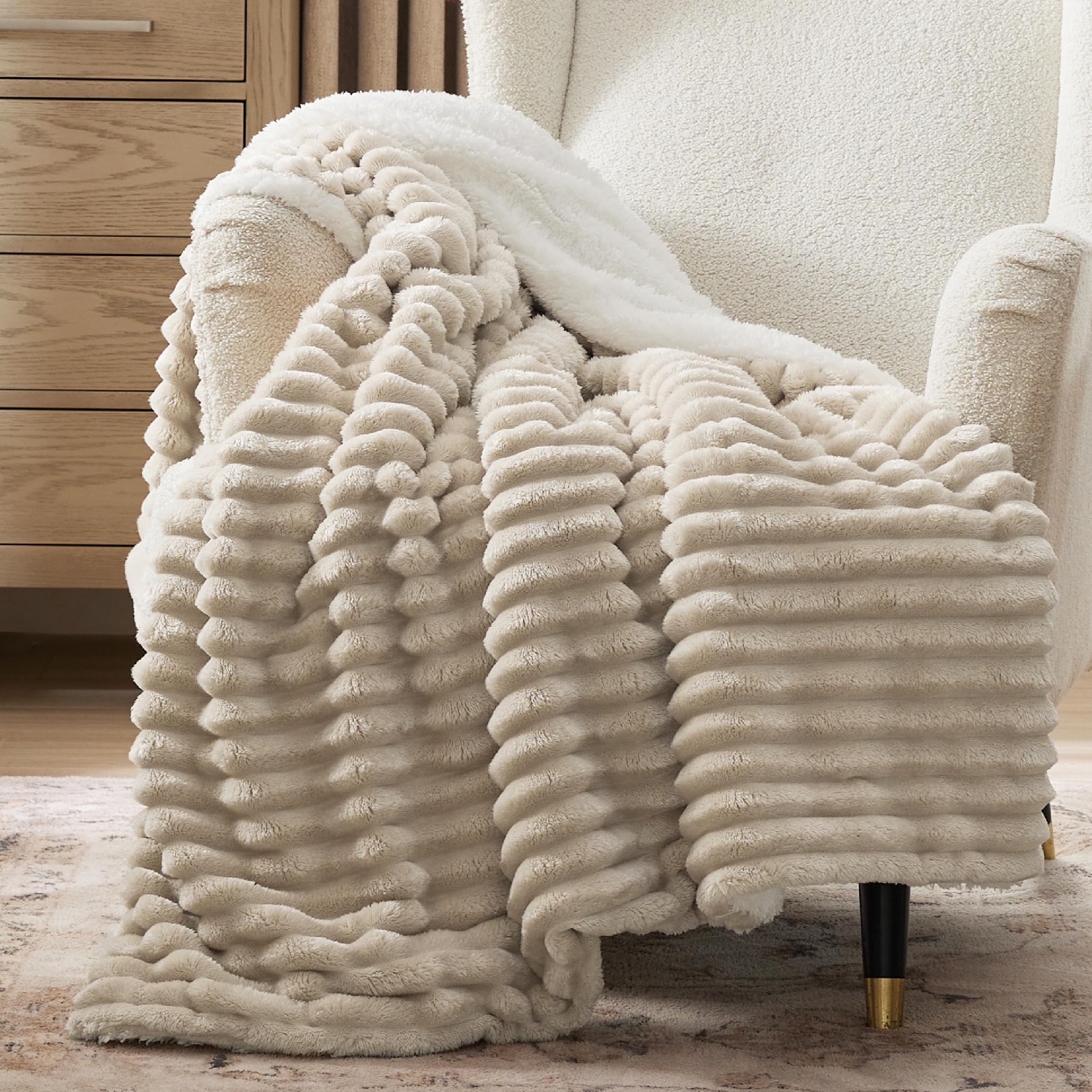 Bedsure beige throw front view showing stripe pattern and reversible sherpa for cozy styling