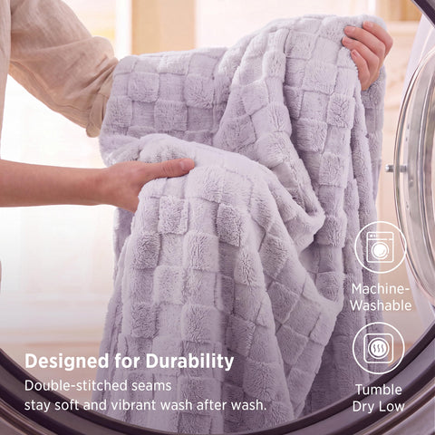 Bedsure next to a chair for size comparison showing generous dimensions and coverage