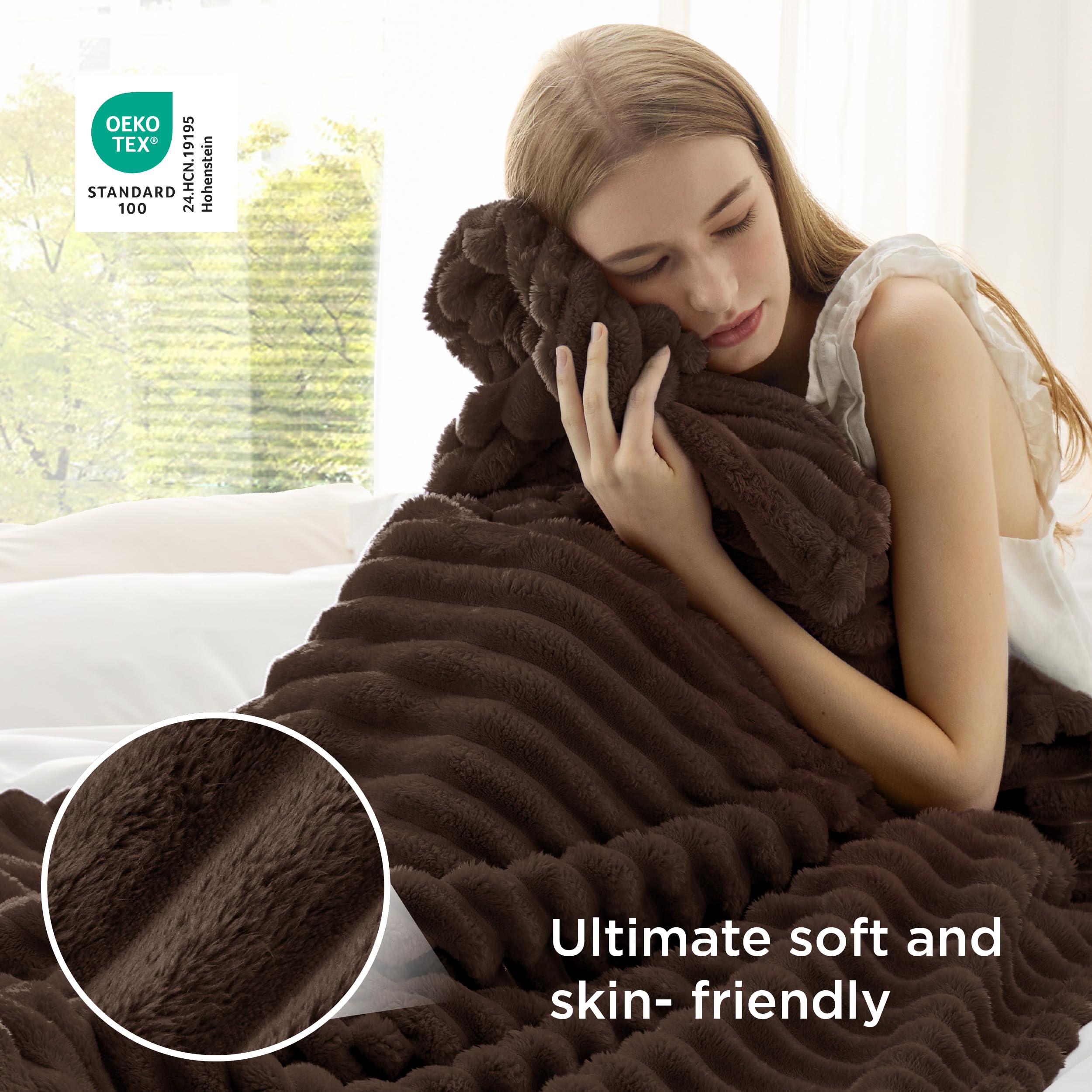 Bedsure next to seated person showing 50x70 scale for comfortable coverage